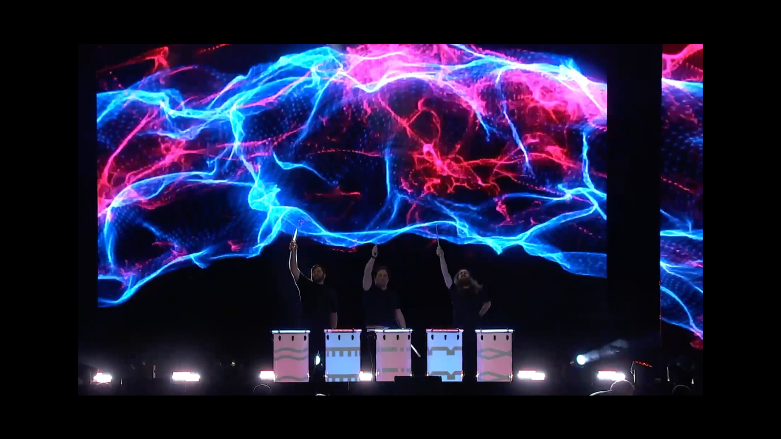 LuminaDrums LED percussion show on a corporate stage